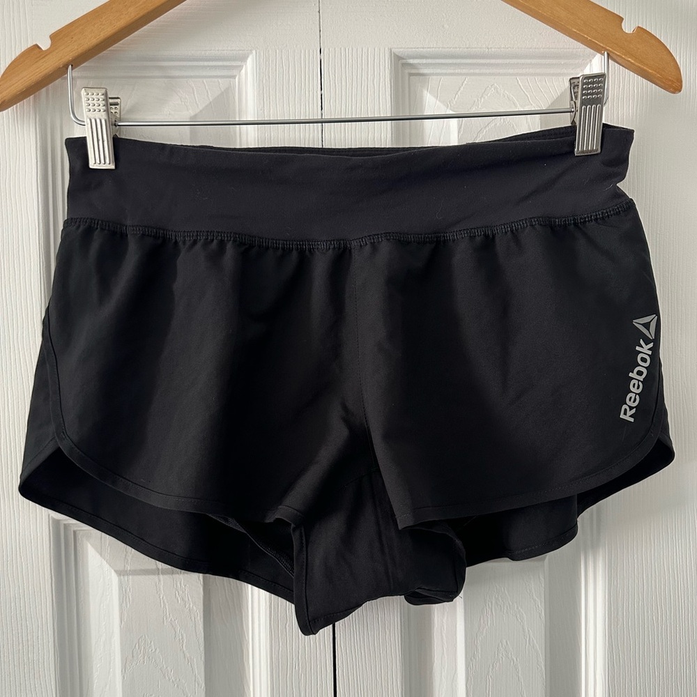 Reebok women’s two in one sports shorts.